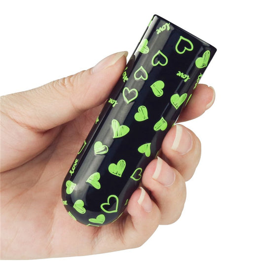 vibratore_heart_massager_glow_in_the_dark con mano